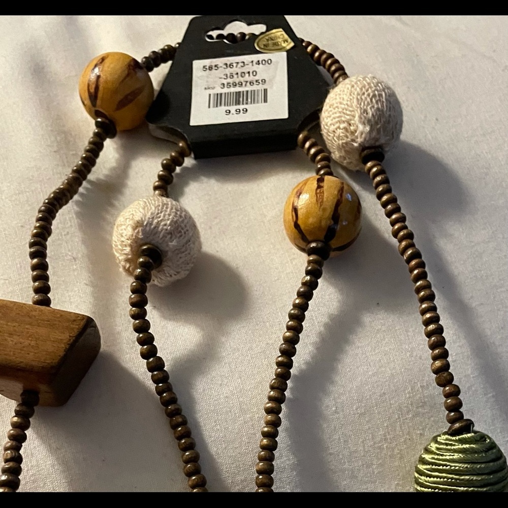 30 inch beaded necklace in green/brownish tones very light